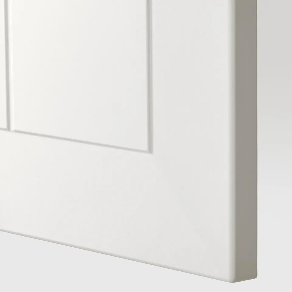 White cabinet door detail - smooth, clean finish; appears well-crafted.
