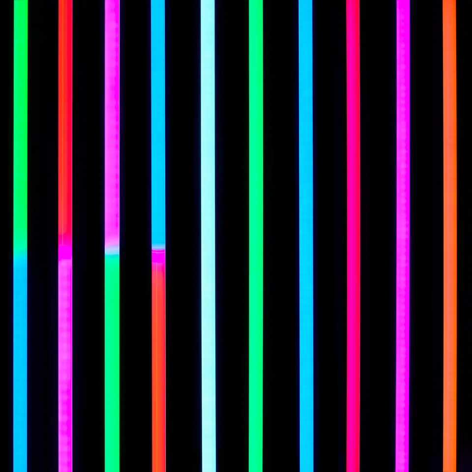 Vibrant vertical stripes in various colours. Dark background. High-quality, smooth gradient transitions.