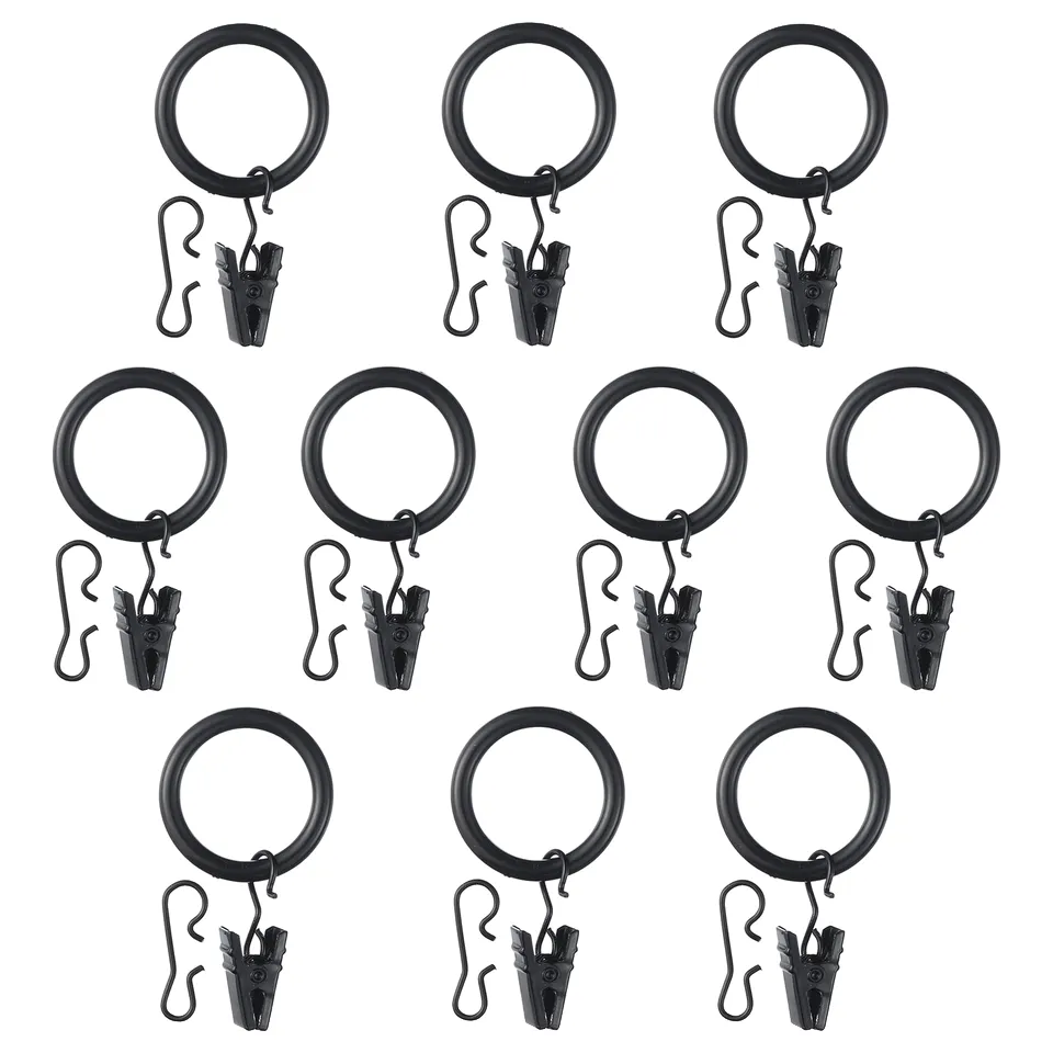Twelve black curtain rings with hooks and clips, arranged in rows, made of abs plastic and steel, designed for easy curtain hanging.