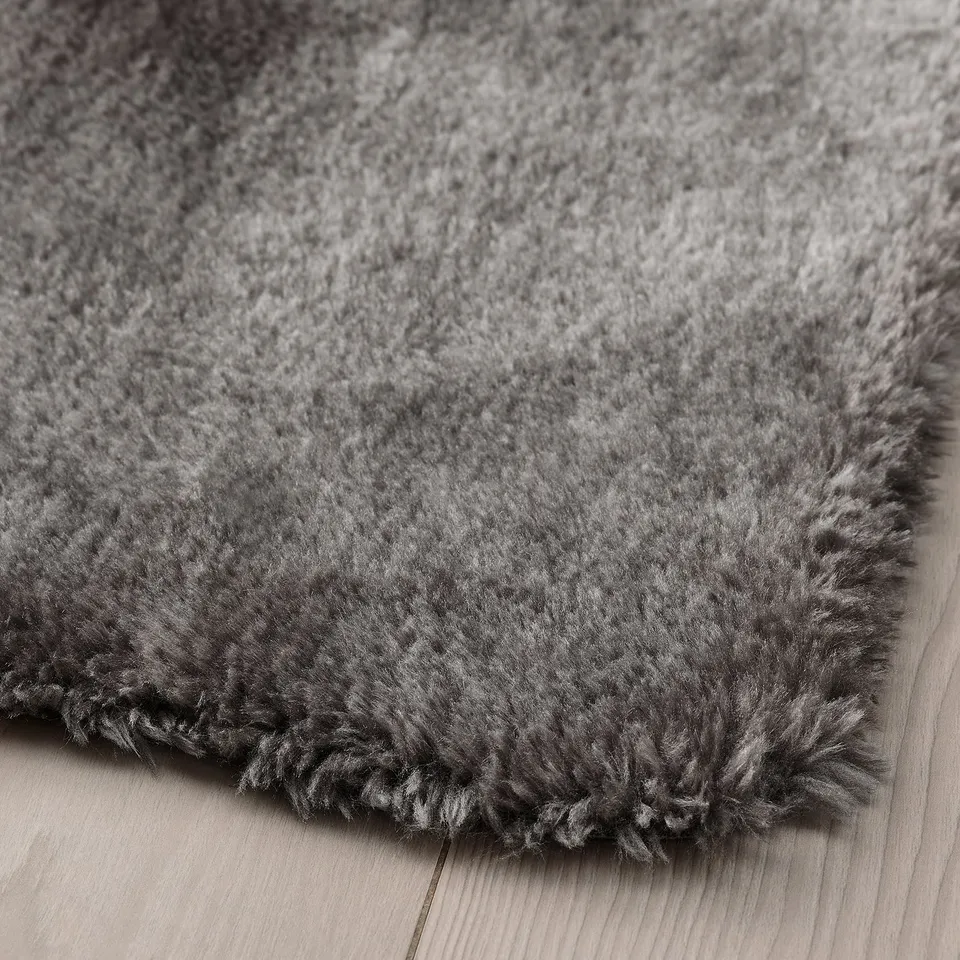 Soft, luxurious, grey rug made from recycled polyester. Cosy and warm, perfect for any room.