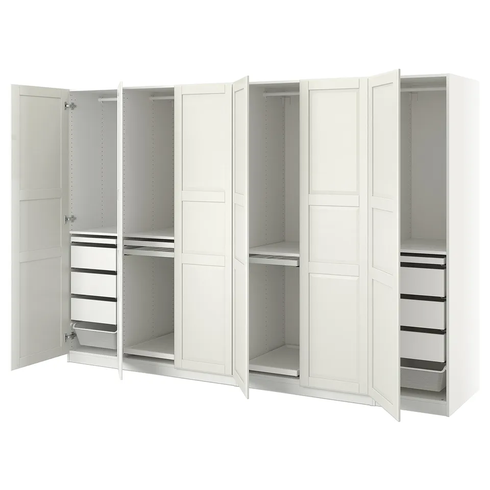 White PAX wardrobe set with multiple storage compartments, shelves, and hanging sections.