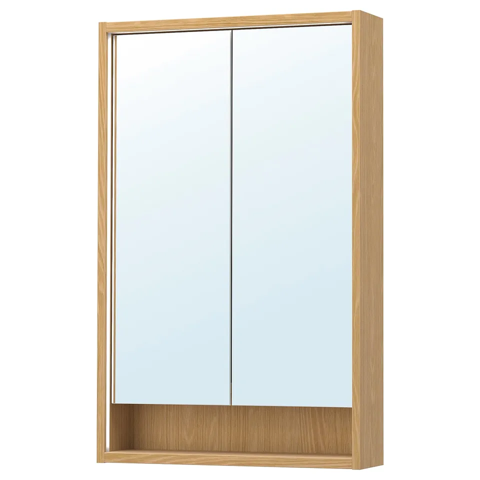 Faxæven: wooden-framed mirror cabinet with integrated lighting.