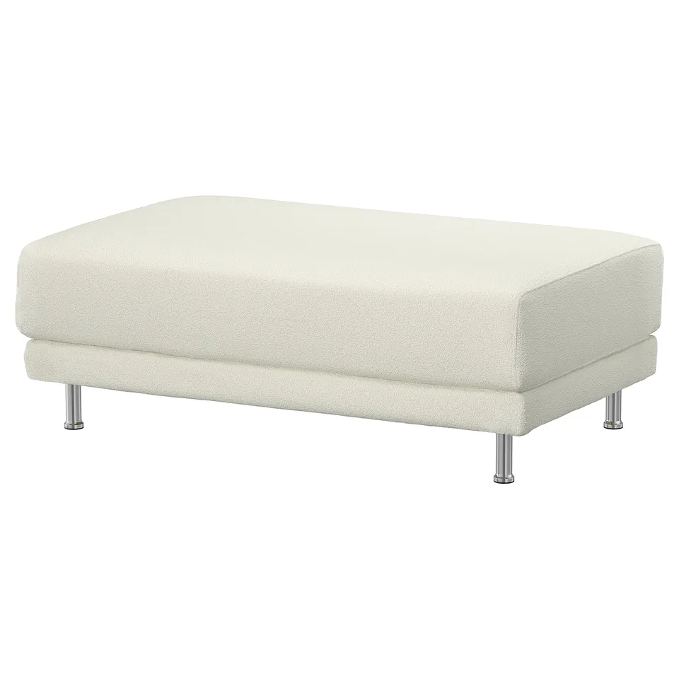 The UPPÅKRA, a white, rectangular upholstered ottoman with chrome legs, offering a sleek and modern design.