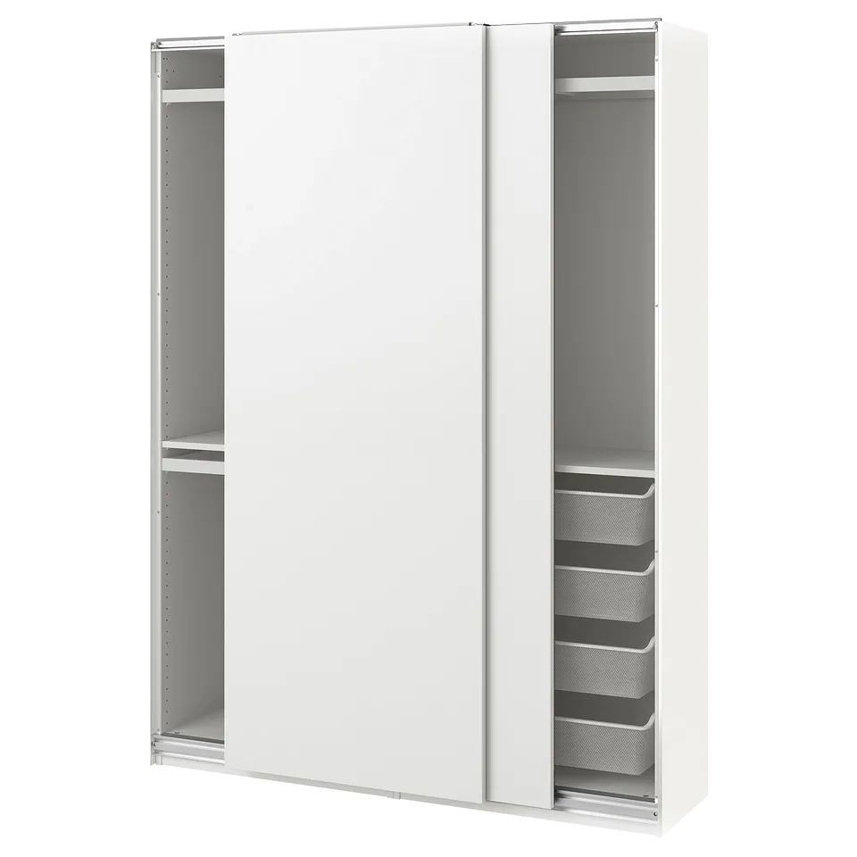A white PAX wardrobe with sliding doors and storage baskets, ideal for compact spaces.