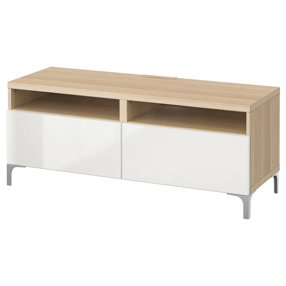 Modern, light-colored BESTÅ tv bench with oak finish, two drawers for storage, and cable management.