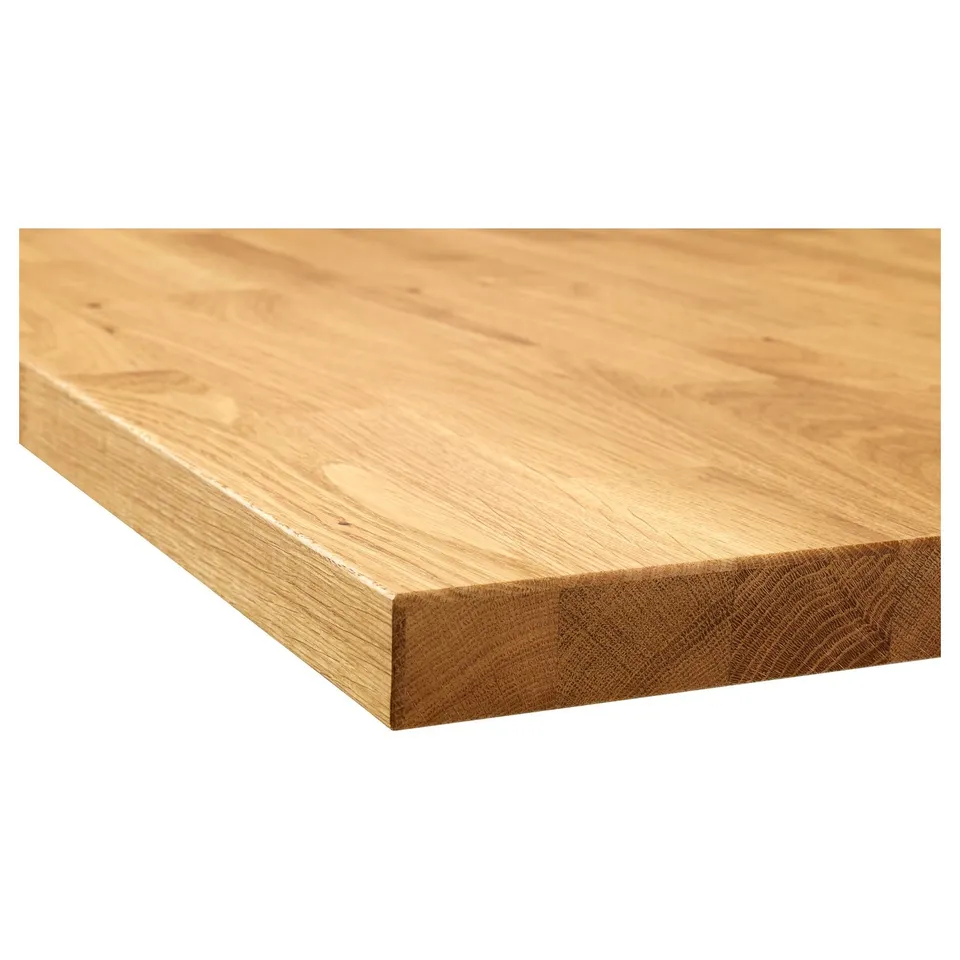 Smooth wood countertop with rounded edge, natural grain.