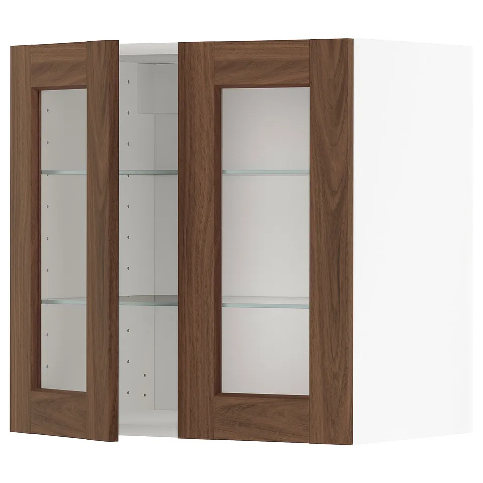 METOD kitchen cabinet, white and dark wood. Glass doors with walnut foil, adjustable shelves, and sturdy frame.