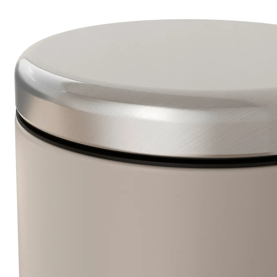 Round waste bin with silver lid and handle, smooth and durable design, fits any room.