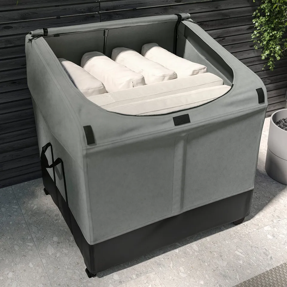 Grey VÄTTERSÖ storage box with cushions, ideal for outdoor use, waterproof.