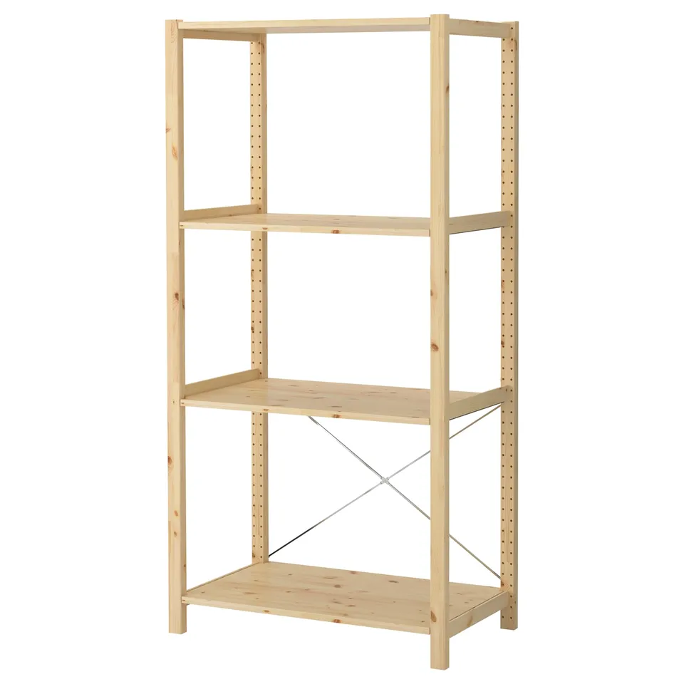 IVAR pine shelf unit. Natural finish, three-tiered, wooden structure.