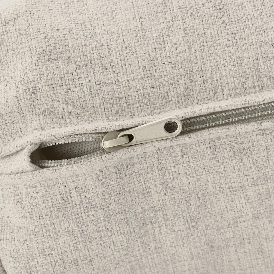 Zip on textured fabric bag, showing quality material and durable design.