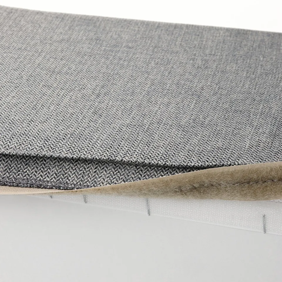 KIVIK footstool in grey fabric, zipped storage, cushioned seat.