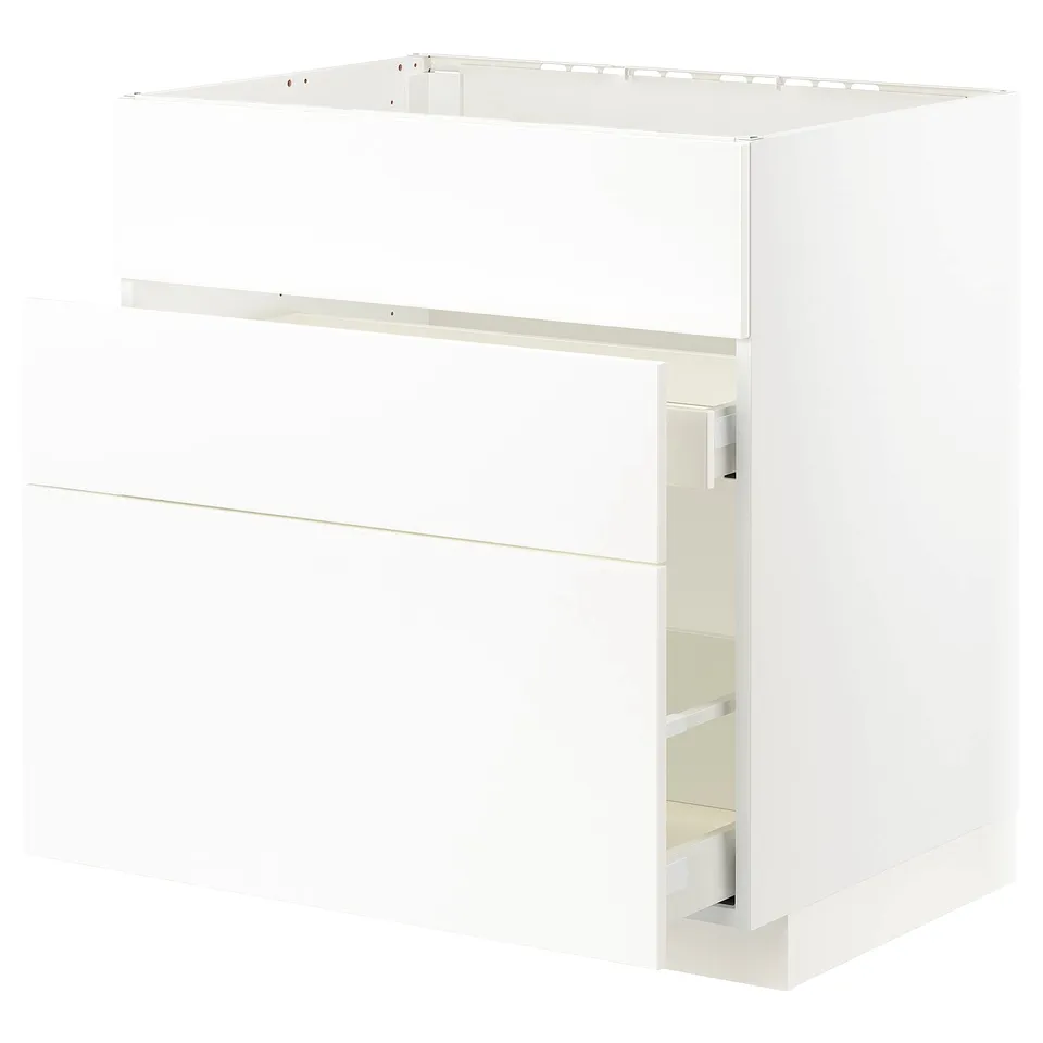 White METOD kitchen cabinet set, modern design with smooth surfaces and drawers.