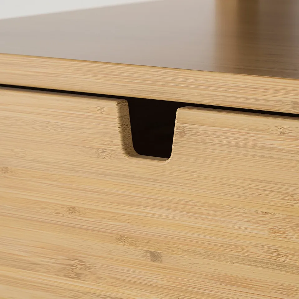 Close-up of finely crafted bamboo drawer, smooth edges, natural finish.