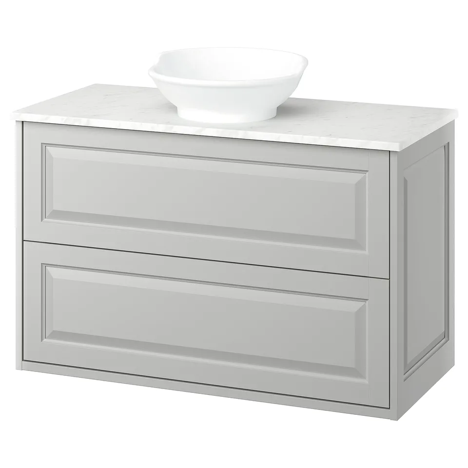 Modern light grey wall-mounted bathroom cabinet with marble countertop and white vessel sink. Clean, minimalist design with two drawers.