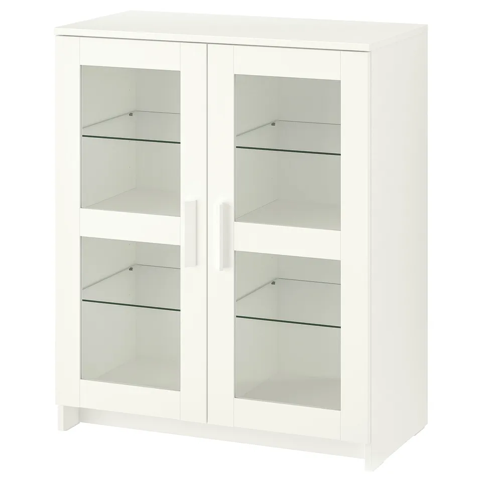 A white BRIMNES cabinet with glass doors on all sides, featuring adjustable shelves inside.