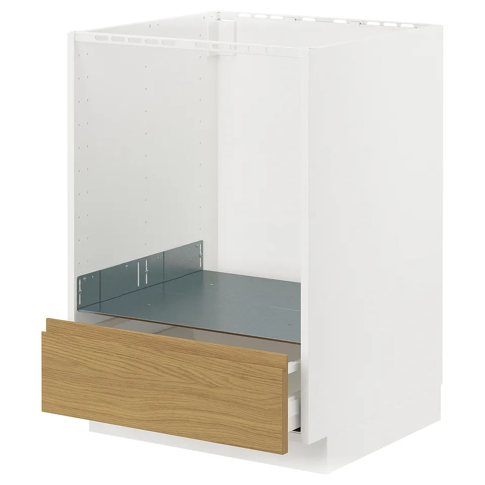 A white METOD kitchen cabinet with an oak drawer. It has a minimalist design with integrated handles.