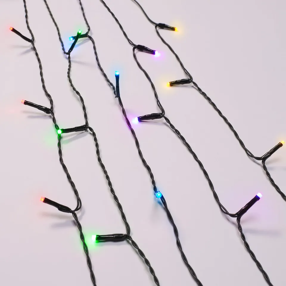 Colourful led lights in blue, green, purple, yellow, zigzagging on white background, battery-operated for indoor/outdoor.