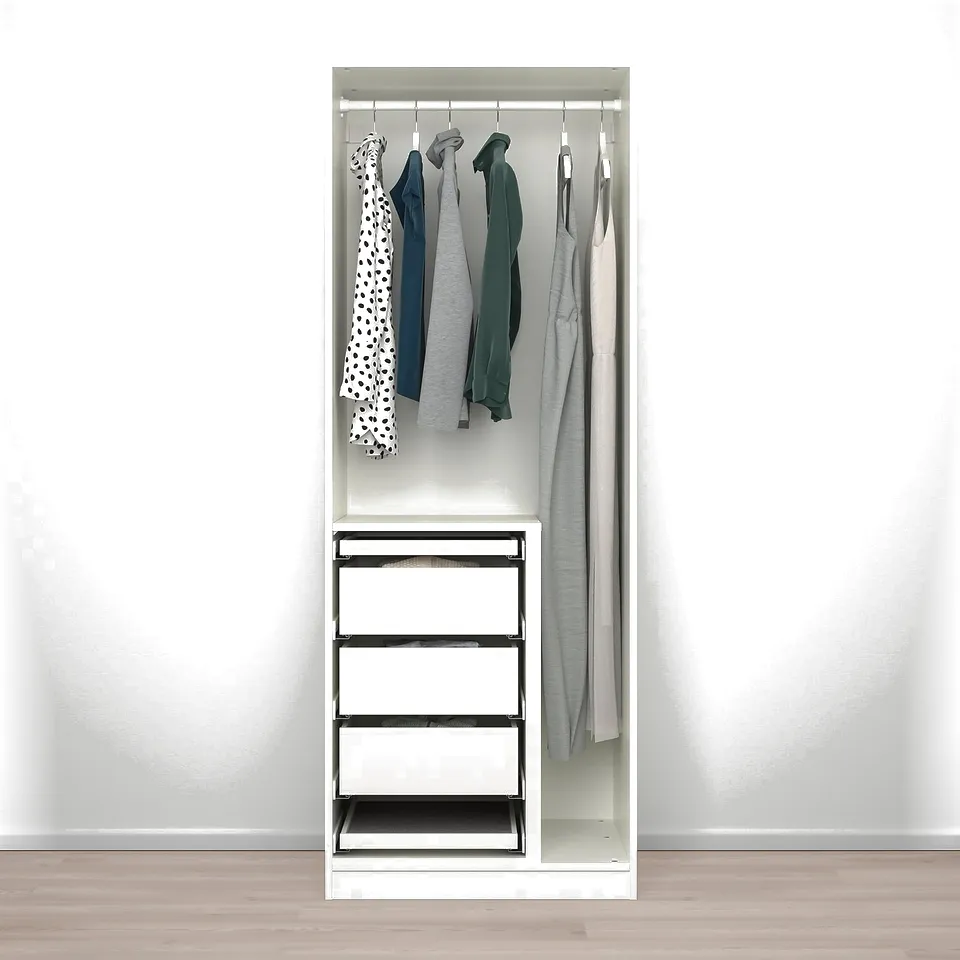 A tall white wardrobe with hanging rail, shelves, drawers, and adjustable space divider.