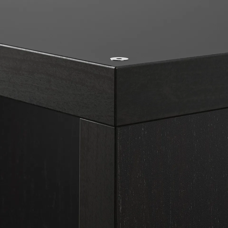 Close-up of sleek, black KALLAX unit showing sturdy edges and minimalist design.