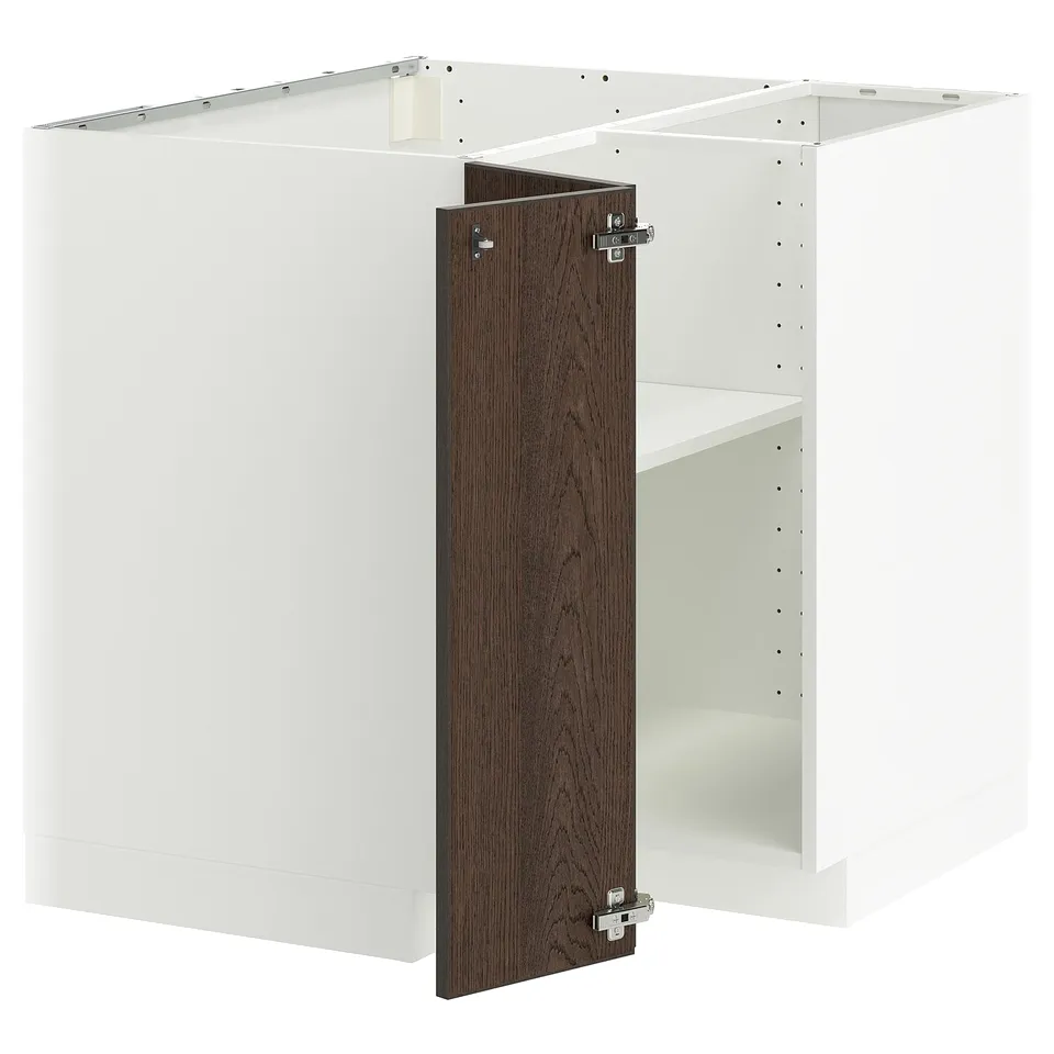 A white METOD kitchen cabinet with a dark brown door.