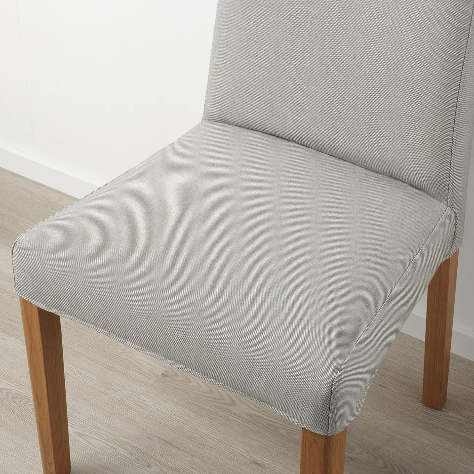 Grey fabric chair with wood legs