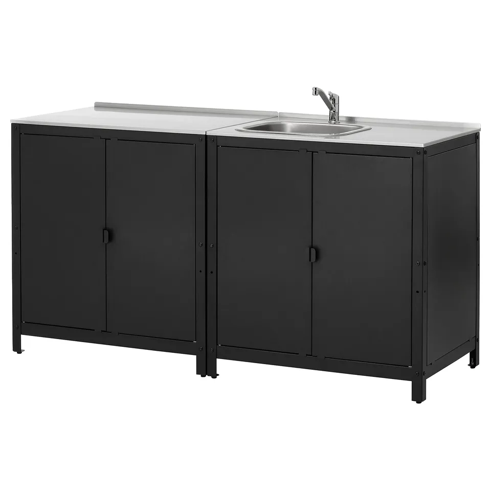 An outdoor GRILLSKÄR kitchen unit in black with a stainless steel worktop and sink, featuring two cabinets.