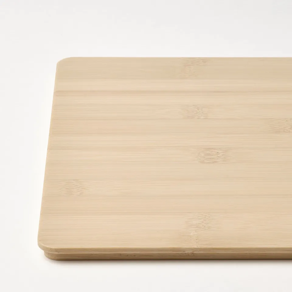 Clean wooden surface, smooth and even texture, likely made from polished bamboo.