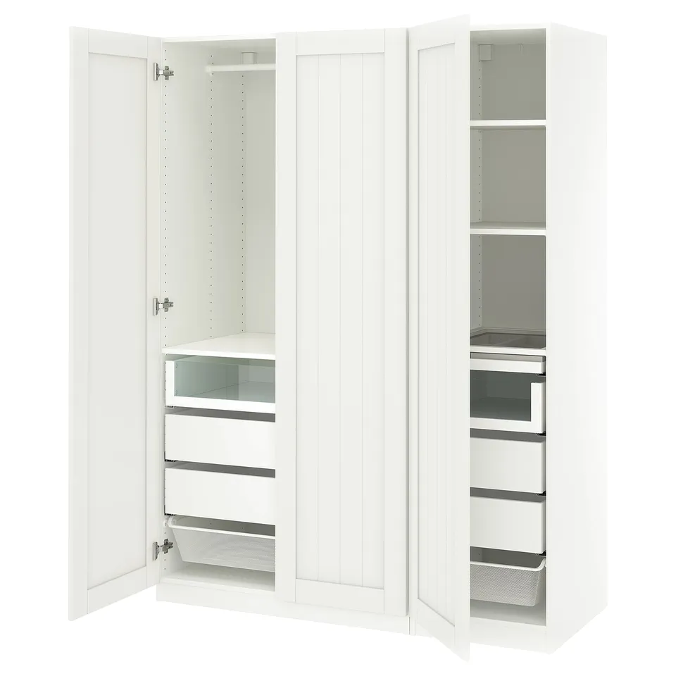 A white ikea PAX wardrobe with open doors, displaying shelves and drawers inside. Its a modern, functional design with white laminate finish.