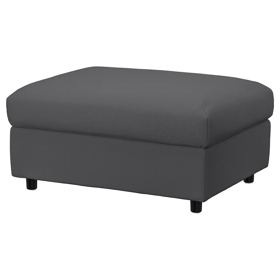 Modern grey fabric stool; square seat, rounded edges, four black feet.