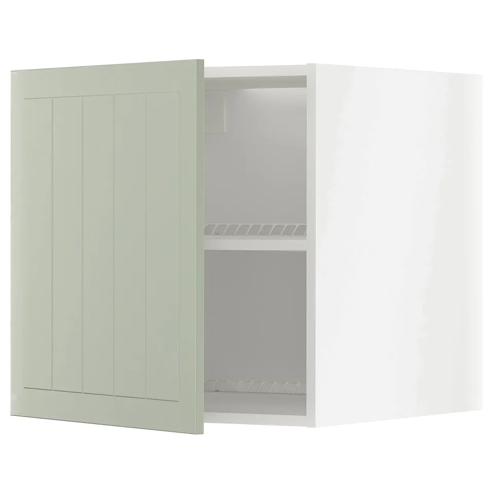 Green METOD kitchen cabinet with adjustable shelves.