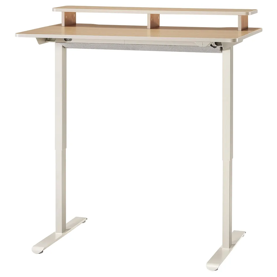 Modern height-adjustable standing desk, light wood top, white legs.