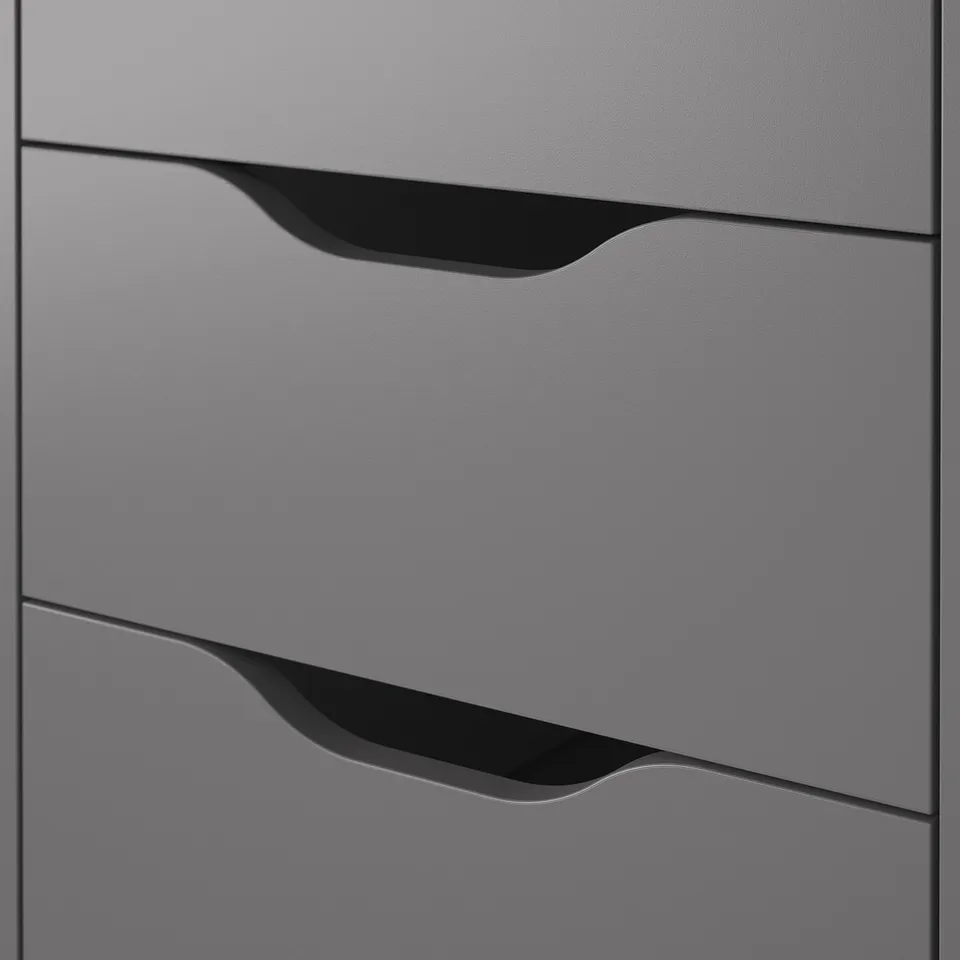 Close-up of modern, grey ALEX drawer unit by IKEA, showcasing sleek design with hidden handles for a minimalist look.