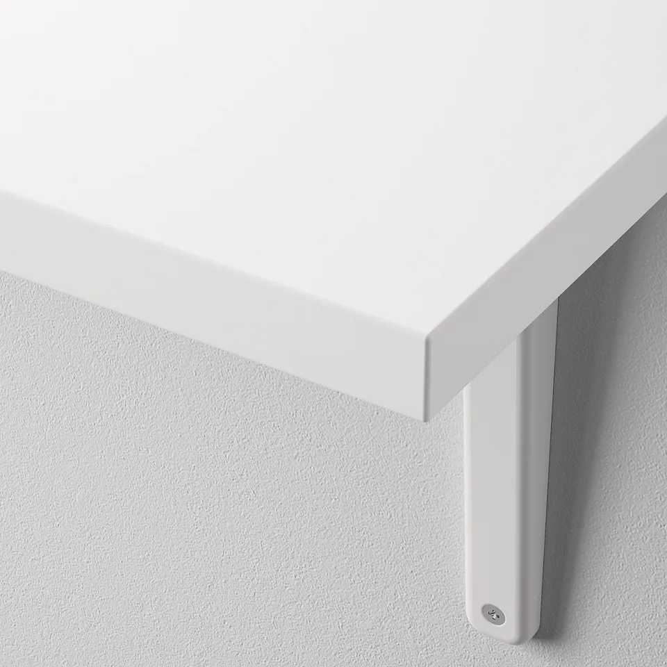 A sleek, modern white wall-mounted shelf with a smooth and bevelled edge, affixed by a sturdy metal bracket.