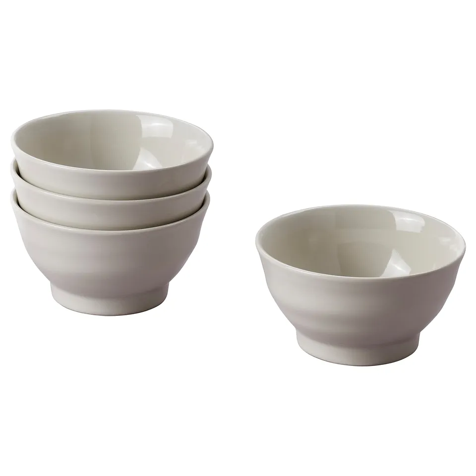 Four grey ceramic bowls, three stacked, one separate. Handmade, rustic, simple design. Machine washable.