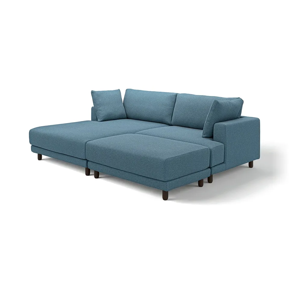 Modern blue sectional sofa, UPPÅKRA, with plush cushions and dark wooden legs, ideal for family comfort.