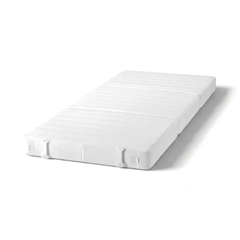 VITHÄLL white multi-functional pouffe with handle and springs.