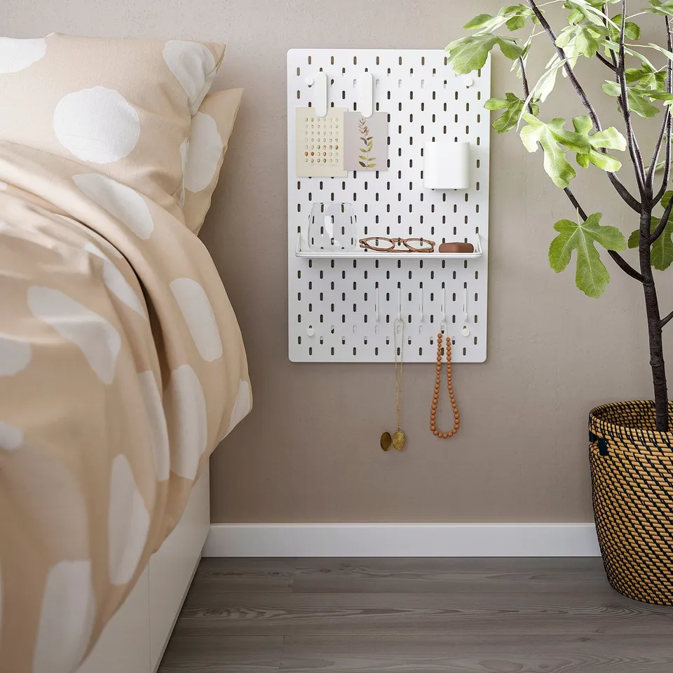 SKÅDIS pegboard, white, steel, rectangular, minimalist, smaller than bed.