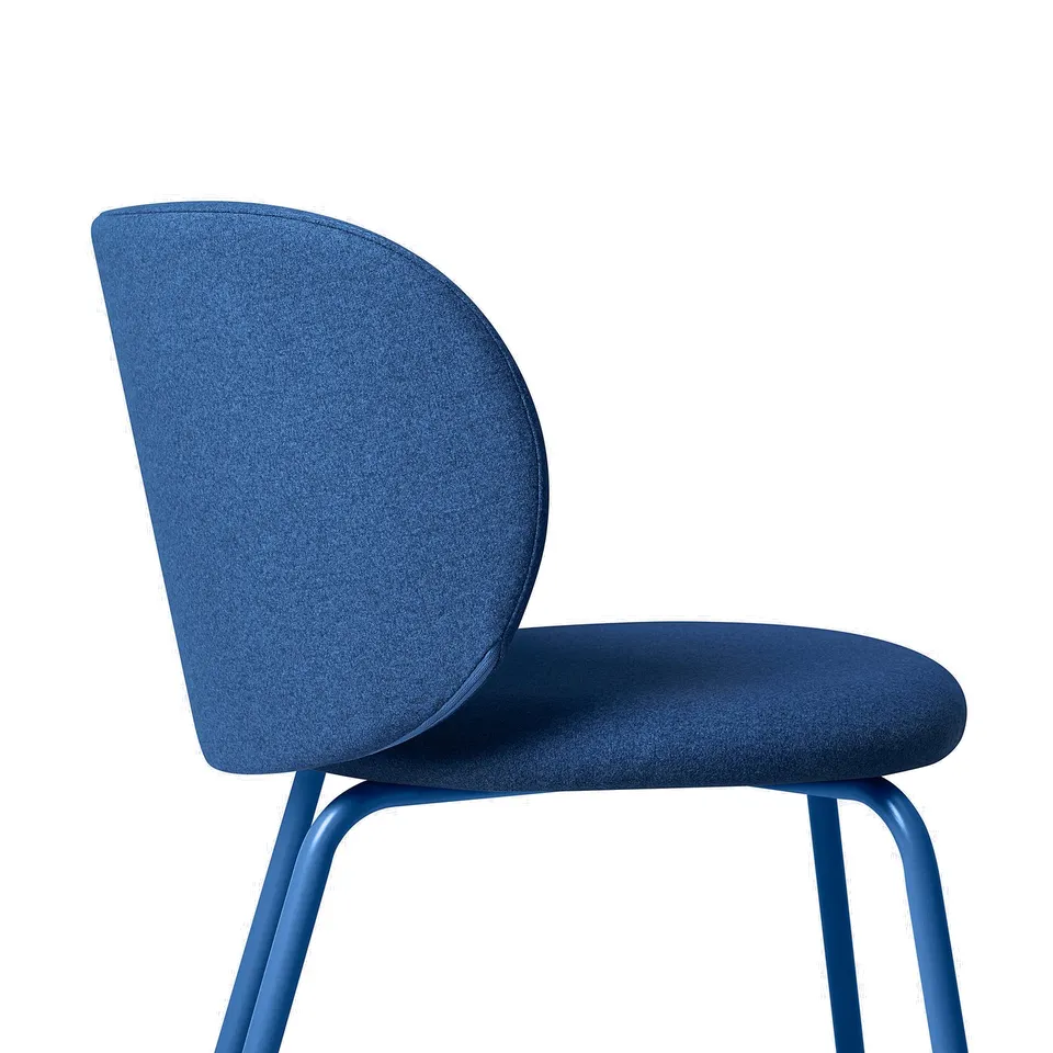 Modern blue chair with curved back and cushioned seat, sturdy metal legs.