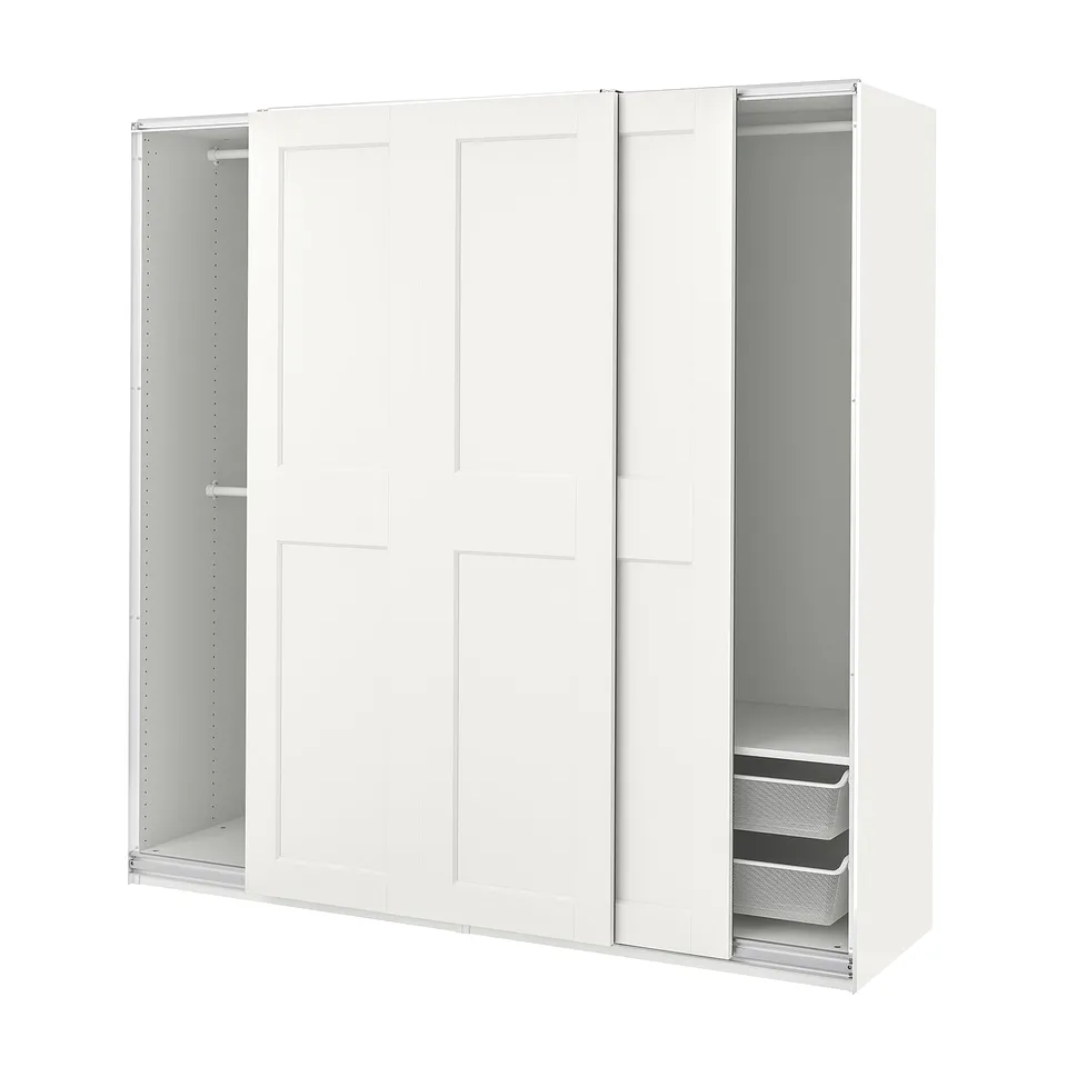 White PAX wardrobe with sliding doors and interior organisers.