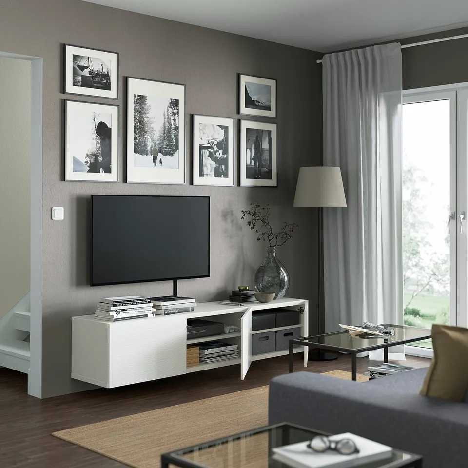 Modern living room with BESTÅ tv bench, adjustable shelves, and decor.