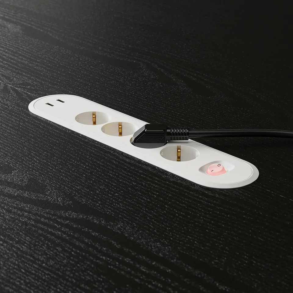 White outlet: 3 sockets, 2 usb ports on black.