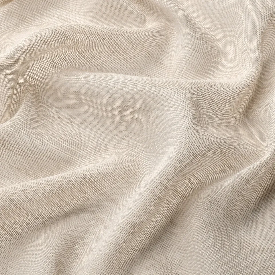 Soft beige sheer curtains, finely woven, draped elegantly - HÄLLEBRÄCKA.