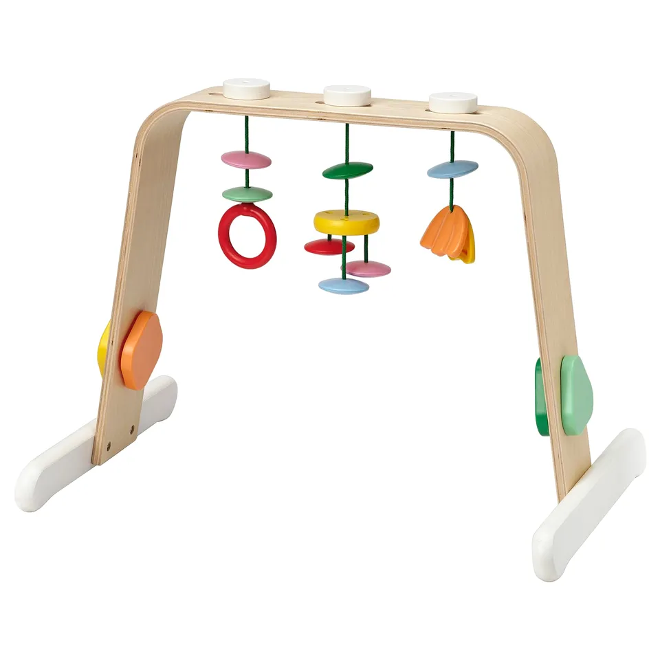 LEKA baby gym: colourful wooden arch with hanging toys for sensory development.
