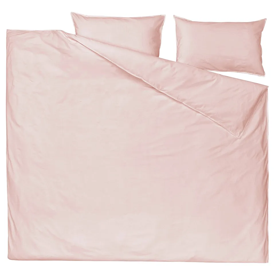 Flat pink bedding set. Soft cotton, simple design. Three pieces: duvet, pillowcases.