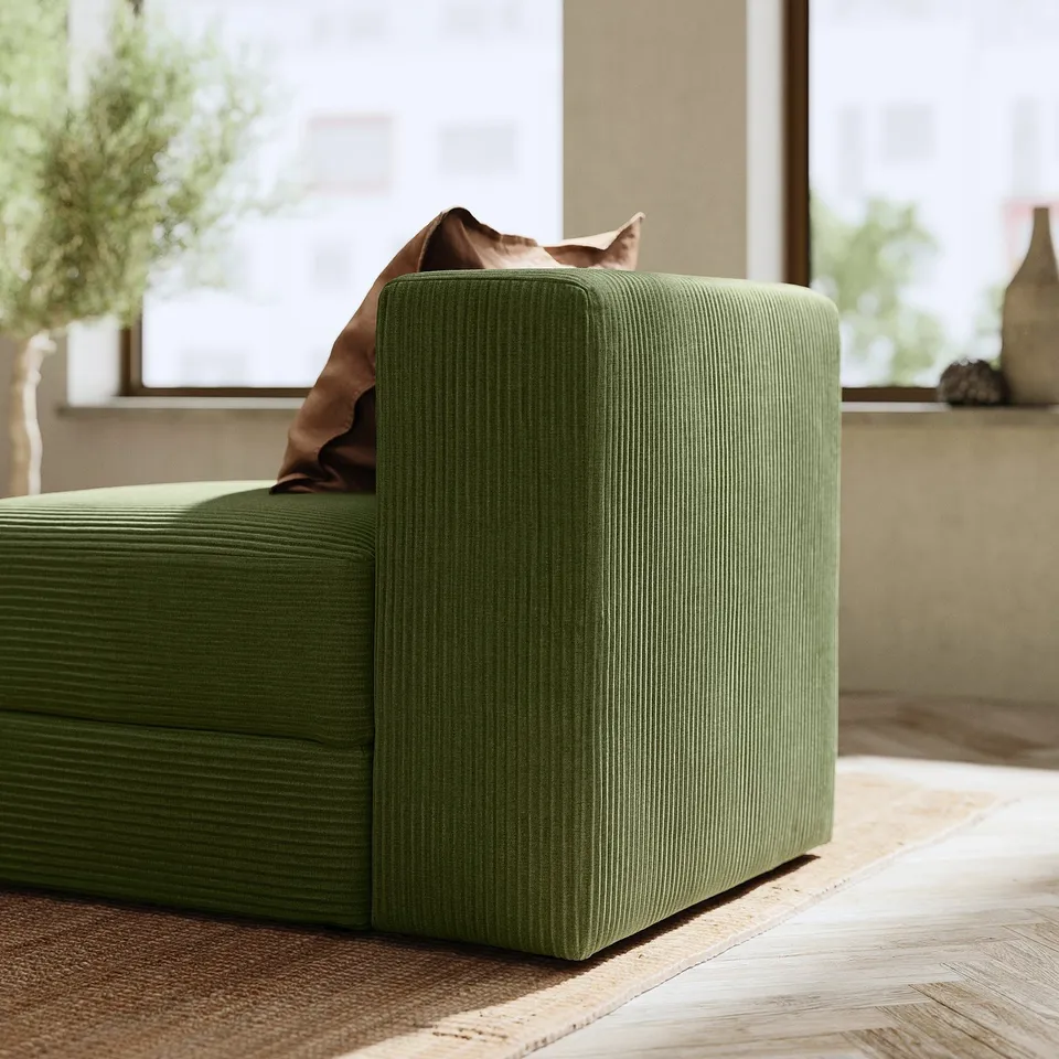 Olive green JÄTTEBO modular sofa, textured with corduroy fabric, rectangular design.