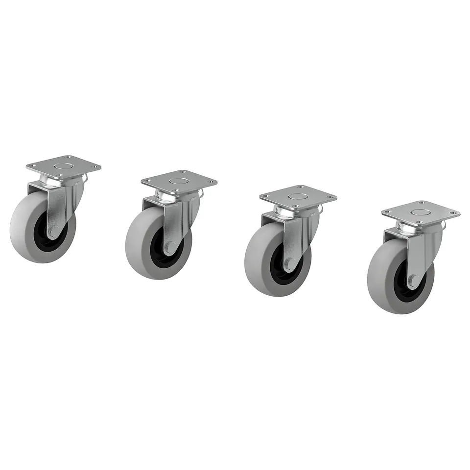 Four silver wheels with grey rubber tyres and metal plate holders, arranged in a line, for easy furniture movement.