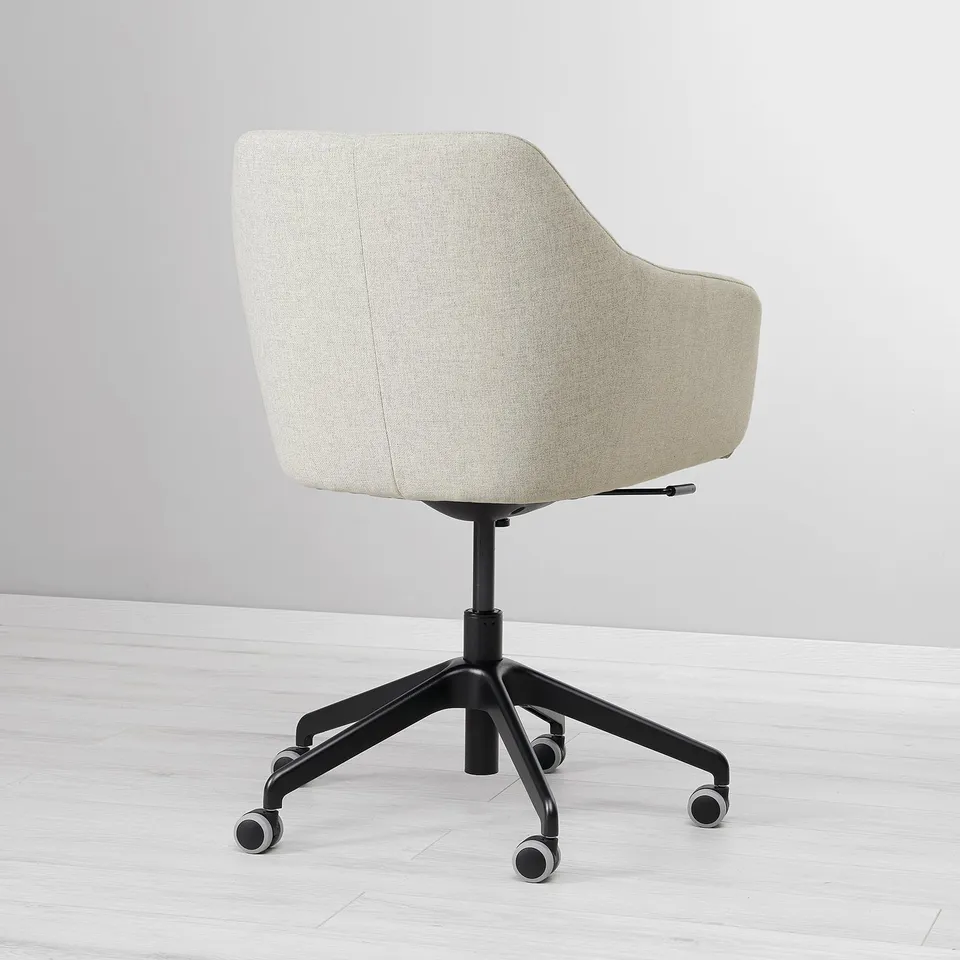 Modern office chair with cushioned seat and back, swivel base, and castors for easy movement.