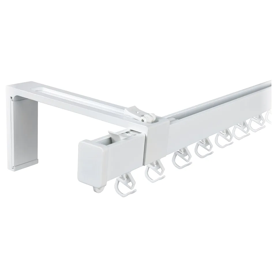 A white VIDGA curtain rail system. It has a rectangular aluminium rail with a wall attachment and plastic gliders for curtains.