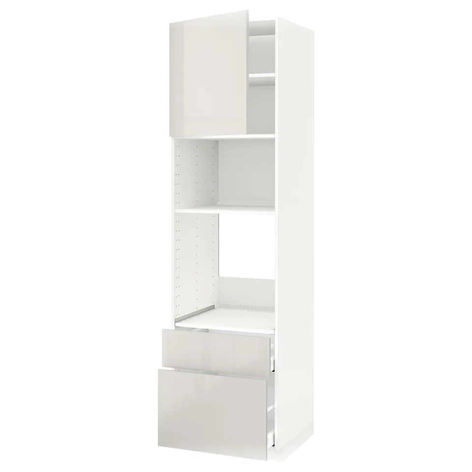 Depicts a high METOD kitchen cabinet in white with adjustable shelves and a drawer, featuring a modern and sleek design.
